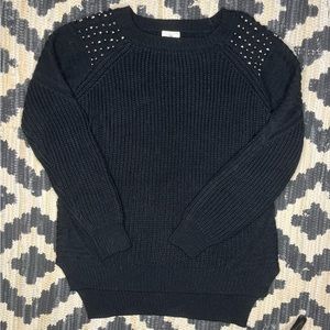 Black sweater with studded shoulders